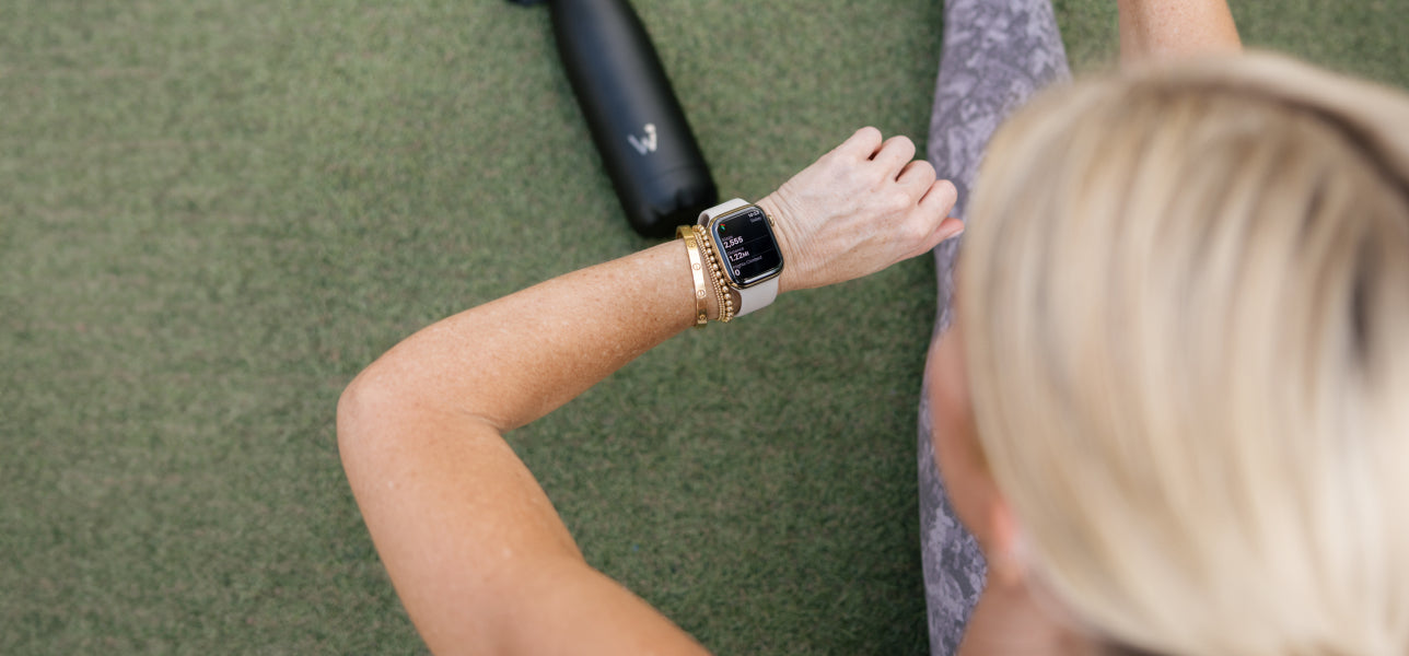 Woman checking her smart watch